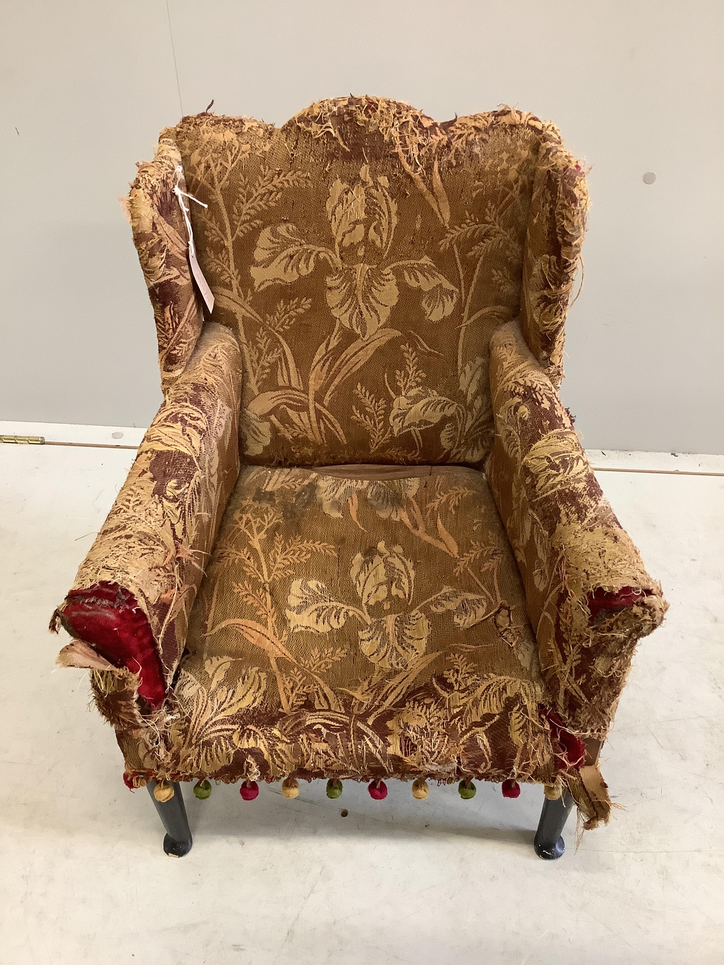 A late 19th century upholstered child's wing armchair, width 46cm, depth 45cm, height 60cm